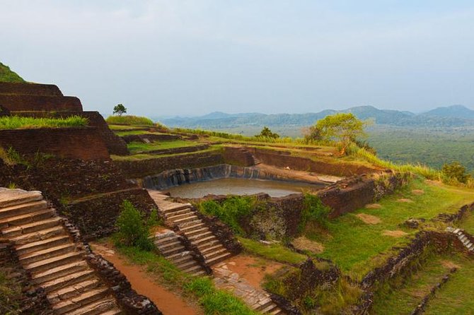 Sigiriya Day Tour From Colombo - Dambulla Cave Temple: Five Caves, Murals, and Hundreds of Figures